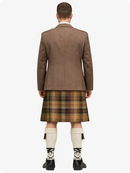 Man wearing a Tan Argyle jacket and plaid kilt on a white background