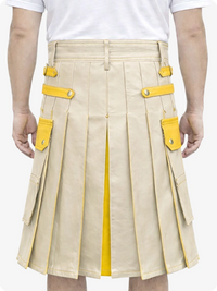 Beige kilt with yellow accents worn by a person on a white background