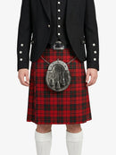 Person wearing a red tartan kilt with a black jacket on a white background