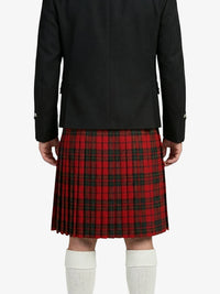 Person wearing a black coat and red plaid kilt on a white background