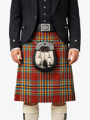 Person wearing a traditional Scottish kilt with a sporran on a white background