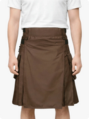 Brown kilt worn by a person on a white background