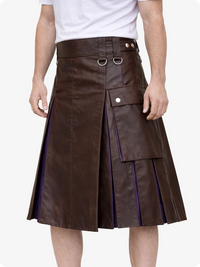 Chocolate Brown leather skirt with metal rings worn by a person on a white background