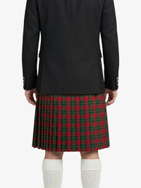 Person wearing a black jacket and red plaid kilt on a white background