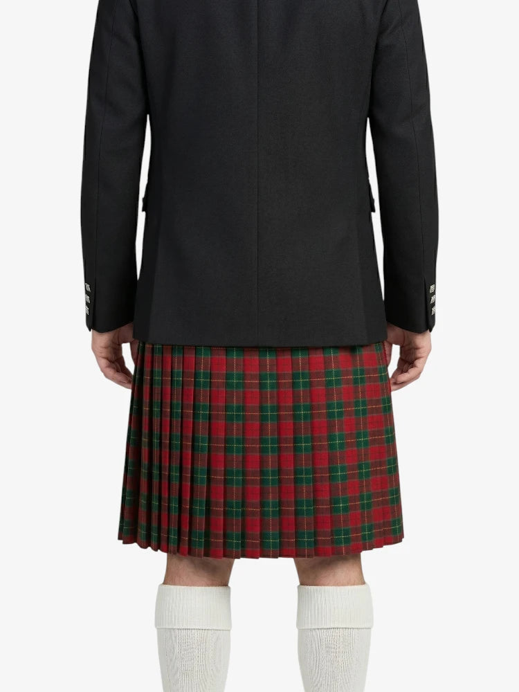 Person wearing a black jacket and red plaid kilt on a white background