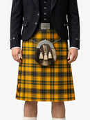 Person wearing a yellow and black plaid kilt with a dark jacket on a white background