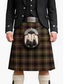 Person wearing a traditional Scottish kilt with a tartan pattern on a white background