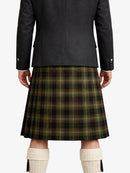 Person wearing a dark jacket and green plaid kilt on a white background