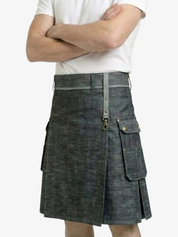 Person wearing a gray denim kilt on a white background