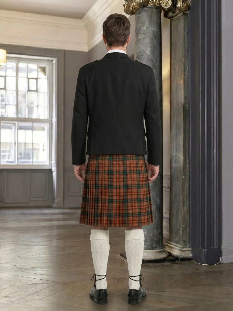 Person wearing a black jacket and red plaid kilt in an indoor setting
