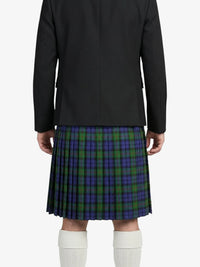 Person wearing a black jacket and plaid kilt on a white background