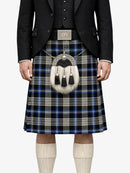 Person wearing a traditional Scottish kilt with a plaid pattern on a white background