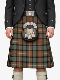 Person wearing a traditional Scottish kilt with a sporran on a white background