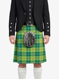Person wearing a green plaid kilt with a black jacket on a white background