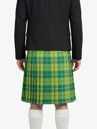 Person wearing a black jacket and green plaid kilt  on a white background