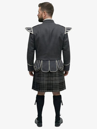 Man wearing a gray jacket with white accents and a grey watch tartan plaid kilt on a white background