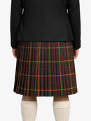 Person wearing a black jacket and plaid kilt on a white background