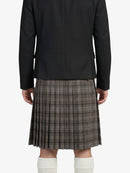Person wearing a black jacket and plaid kilt on a white background