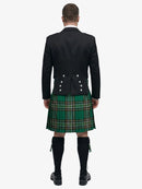 Person wearing a black prince charlie jacket and irish national tartan kilt on a white background