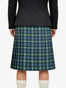 Person wearing a black jacket and plaid kilt on a white background