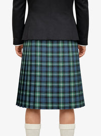 Person wearing a black jacket and plaid kilt on a white background