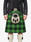 Person wearing a traditional Scottish kilt with a green plaid pattern on a white background