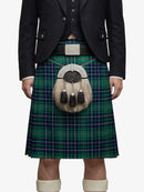 Person wearing a traditional Scottish kilt with a tartan pattern on a white background