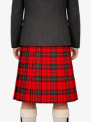 Person wearing a gray jacket and red plaid kilt on a white background