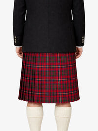 Person wearing a black coat with a red plaid kilt on a white background