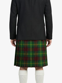 Person wearing a black coat and green plaid kilt on a white background