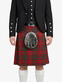 Person wearing a black jacket and red plaid kilt with a silver sporran on a white background