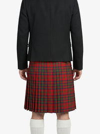 Person wearing a black jacket and red plaid kilt on a white background