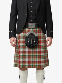 Person wearing a black jacket, red plaid kilt, and white knee-high socks on a white background