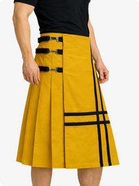 Mustard Yellow skirt with black accents worn by a person on a white background
