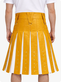 Yellow pleated skirt with white accents worn by a person on a white background
