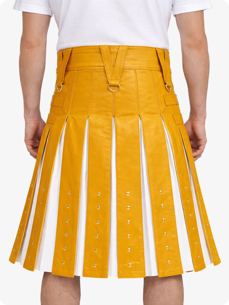 Yellow pleated skirt with white accents worn by a person on a white background