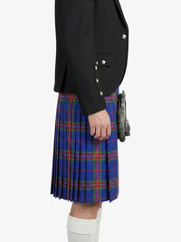 Person wearing a black jacket and blue plaid kilt on a white background