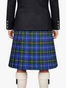 Person wearing a dark jacket and blue plaid kilt on a white background