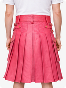 Pink pleated skirt with gold buttons on a white background
