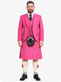 Man wearing a bright pink kilt with a white background