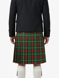 Person wearing a black coat and red plaid kilt on a white background