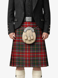 Person wearing a traditional Scottish kilt with a sporran on a white background