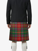 Person wearing a black jacket and red plaid kilt on a white background
