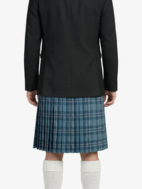 Person wearing a black coat, blue plaid kilt, and white knee-high socks on a light purple background