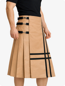 Tan skirt with black accents worn by a person on a white background