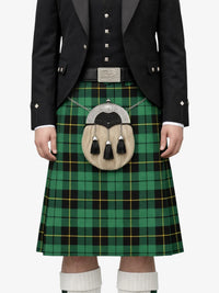 Person wearing a green plaid kilt with a black jacket on a white background