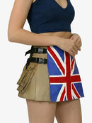 Person wearing a skirt with a Union Jack design on a plain background
