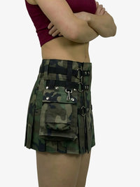 Camouflage skirt with tactical details worn by a person on a white background